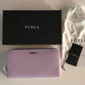 Furla extra large zip around leather wallet. Brand new with tags in box